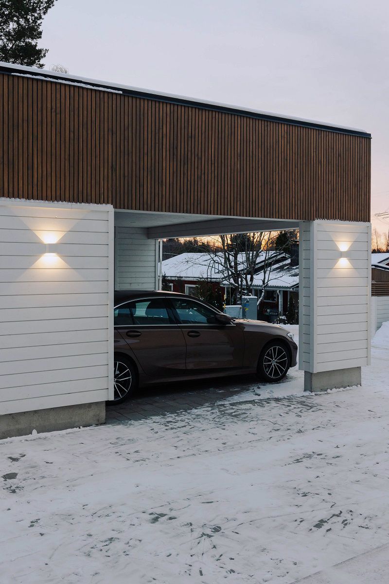 White wall FUNK light on the carport wall.